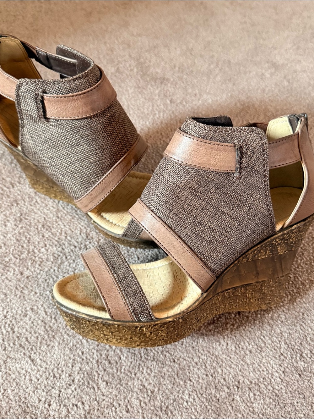 Women’s Wedges with stacked heel and cut out detail, size 7.
